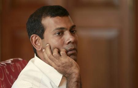 Maldives' President Mohamed Nasheed listens to a question during an interview with Reuters in Male January 29, 2012.  REUTERS/Dinuka Liyanawatte
